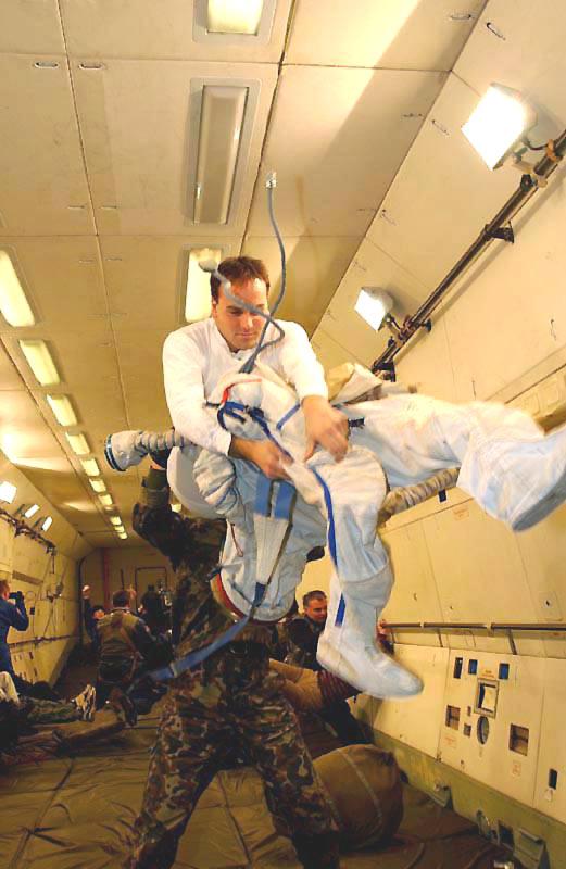 Donning a Space Suit in Weightlessness